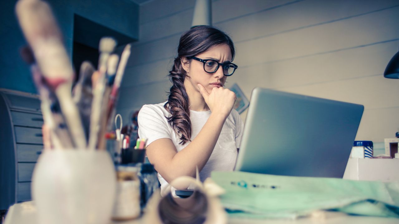 woman looking at laptop